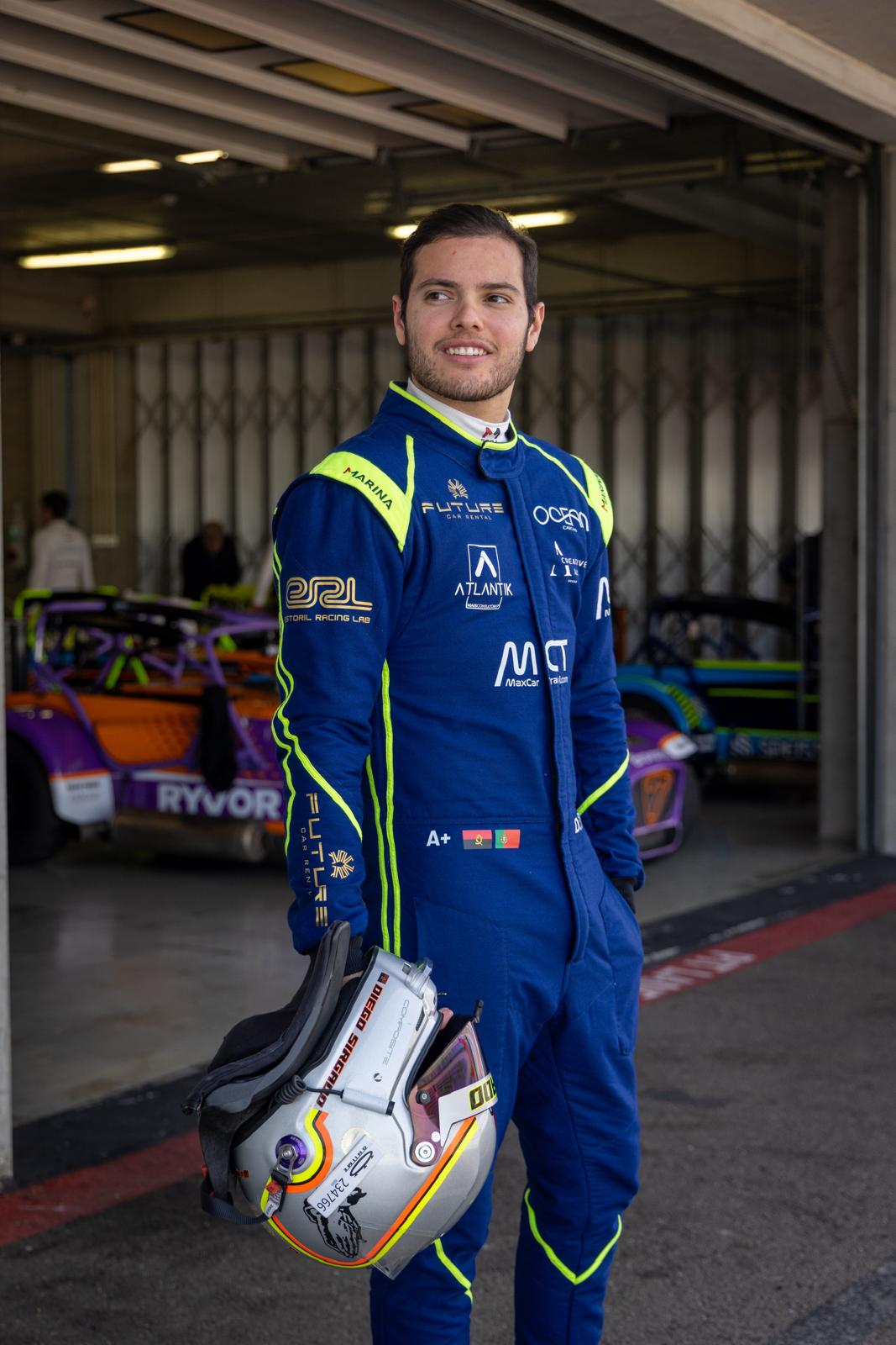 Diego Sirgado in the paddock with race suit and helmet
