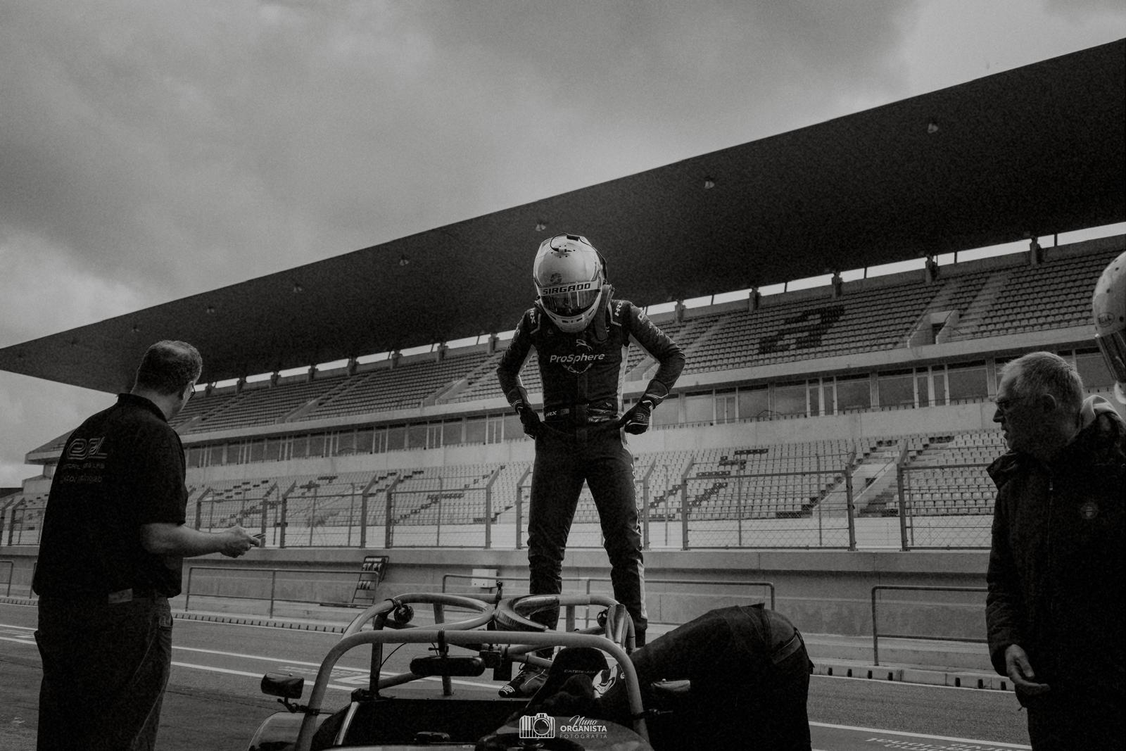 Diego Sirgado on the Estoril pit lane in black and white