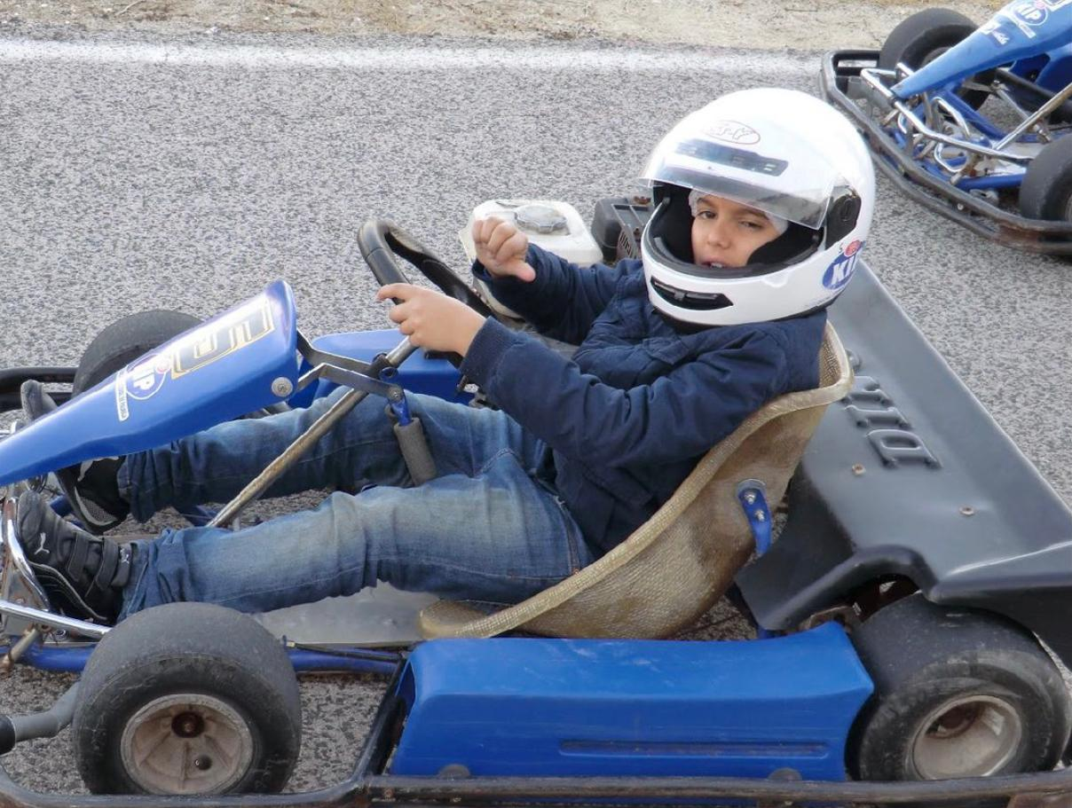 Young Diego Sirgado sitting in his first kart